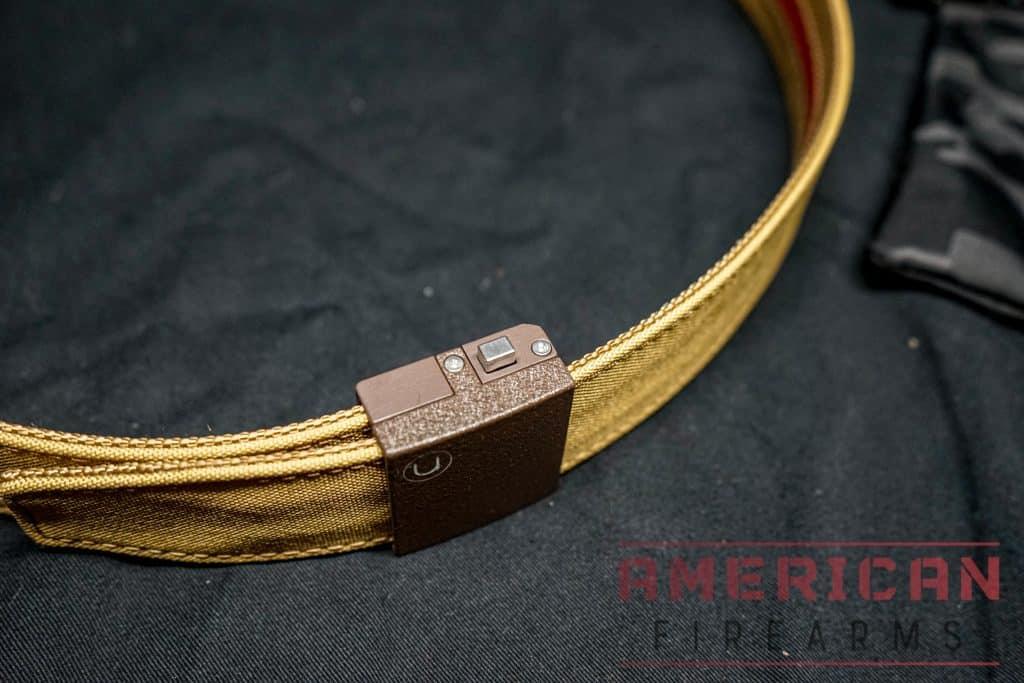 Pull the end of the belt through the buckle and you're done.