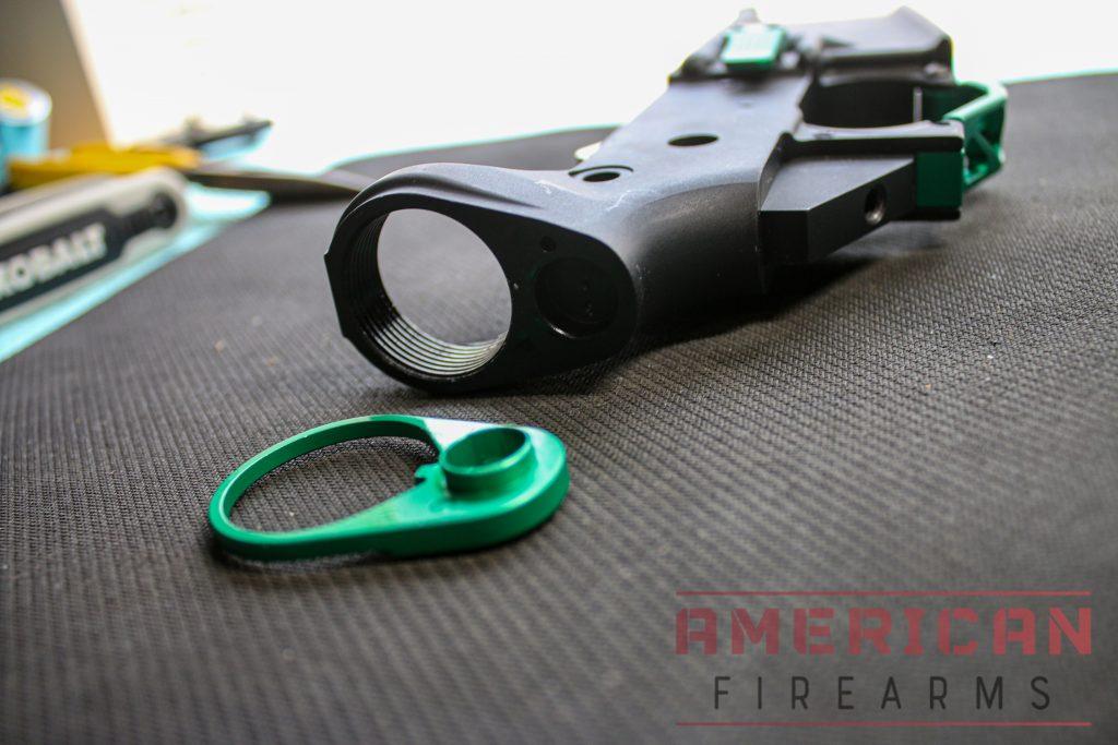 Slide the QD attachment onto the buffer tube with the protruding side facing the lower.