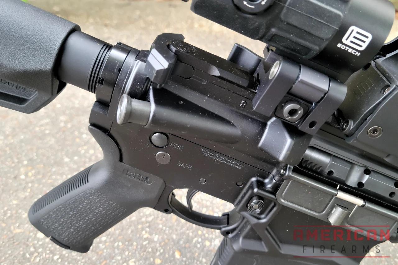 The safety selector switch and bolt release are on the left while the magazine release button is on the right-- as with just about every AR-15.