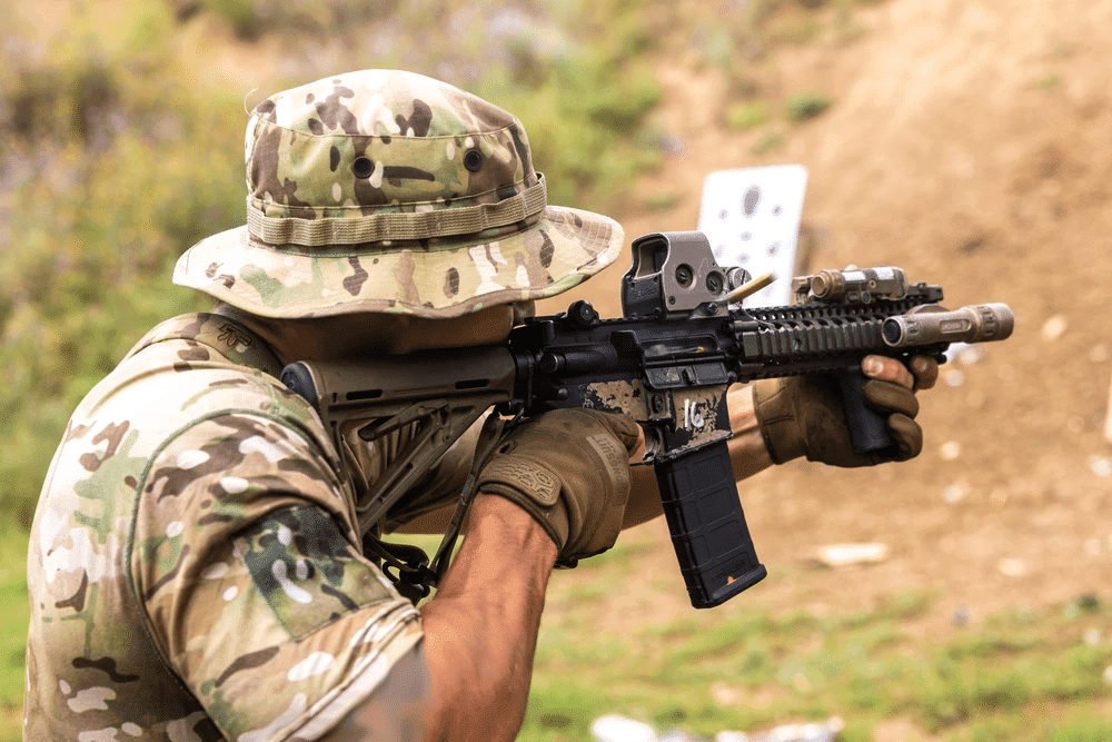 U.S. Navy SEAL fires a MK18 rifle at a range during exercise Sea Breeze 21 in Ochakiv, Ukraine, July 8, 2021