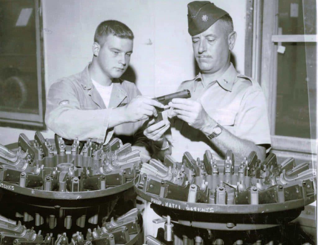 Inspecting National Match Colt pistols at Springfield Armory (Photo via Springfield Armory National Historic Site)