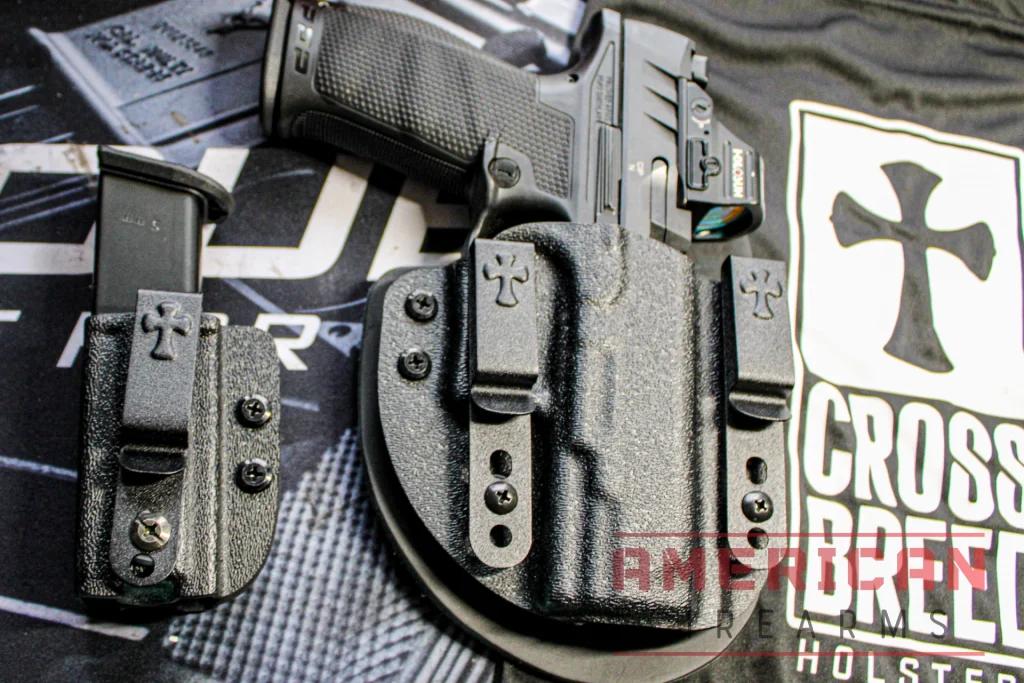 The Reckoning is a system which pairs a mag carrier with holster.