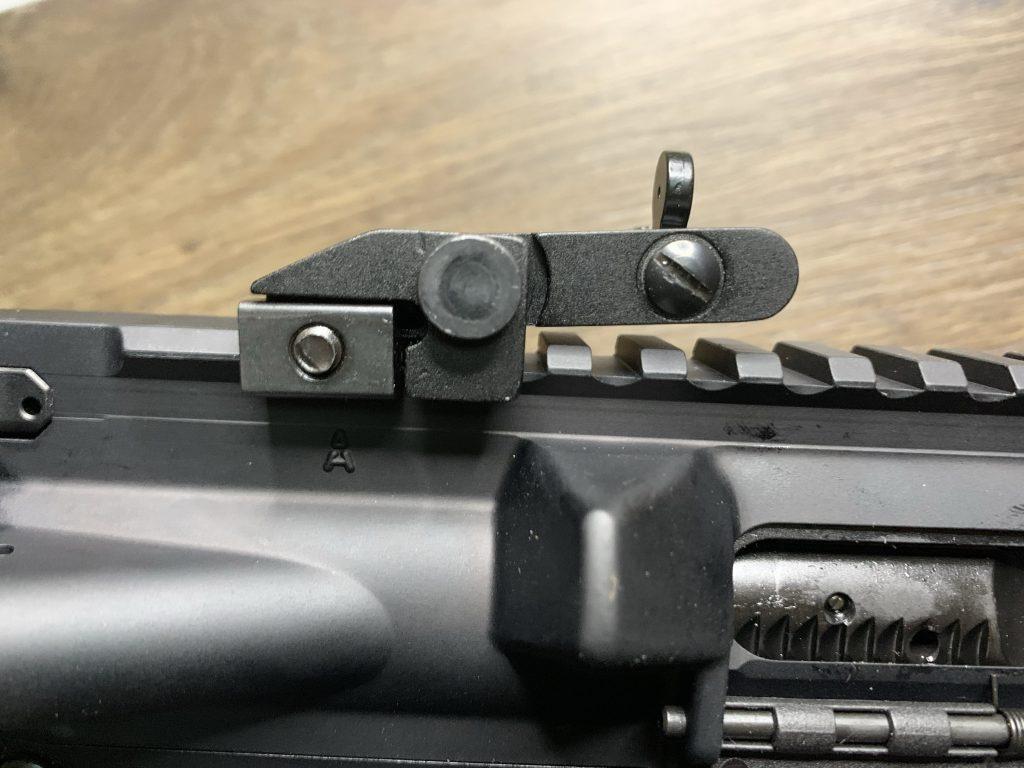 Rear sight folds better with the tight peep folded back.
