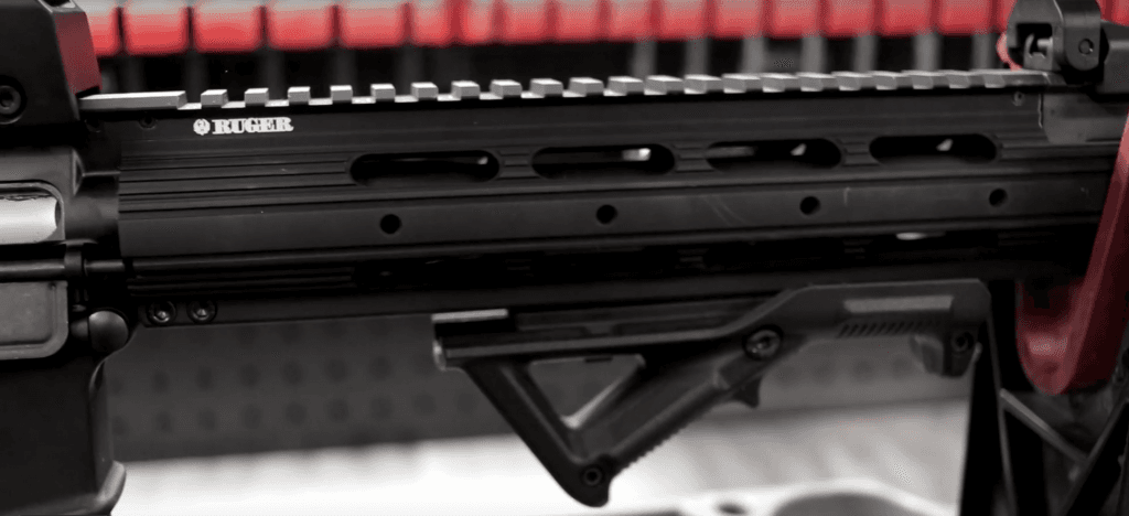The handguard offers loads of M-LOK slots and topped with a full length Picatinny rail to accomodate both BUIS and an optic.