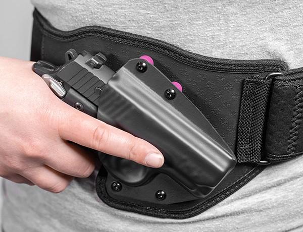 Tactica pairs a molded kydex holster with a solid belly band, giving you secure retention. Photo via Tactica.