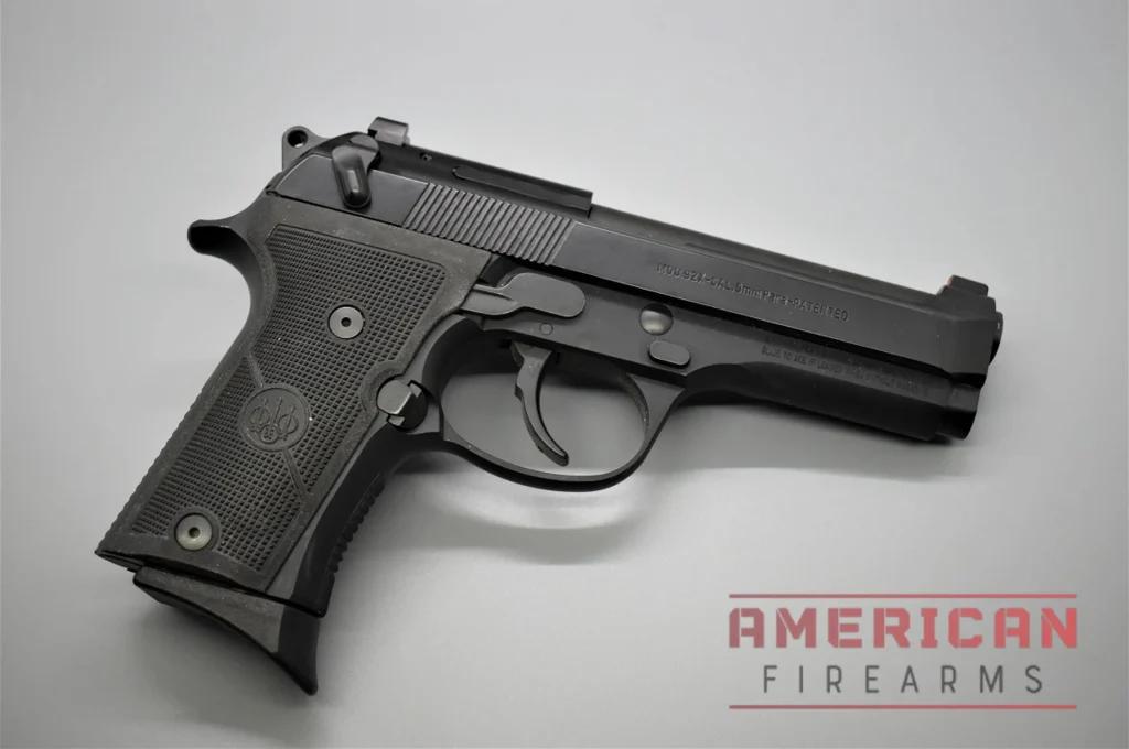The Beretta 92X Compact -- with its external hammer and steel sights -- in the wild