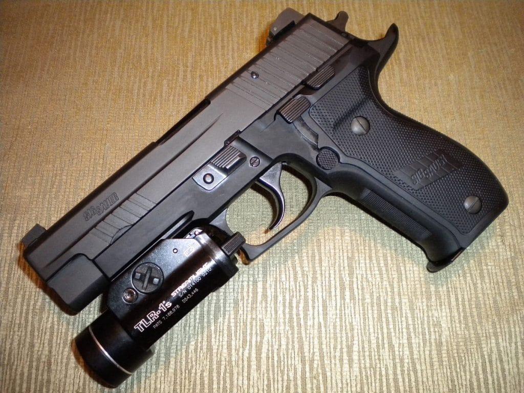A Streamlight pistol light mounted on a Sig P226