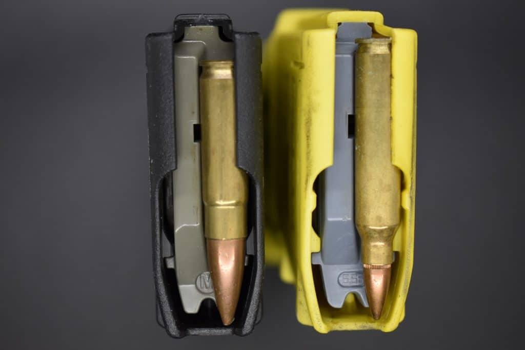 While the .223/5.56 NATO (yellow mag) generally runs 55 to 77-grain bullets, the chunky .300 BLK (black mag) starts at about 100 and goes all the way up to around 220-grains. This makes for a slower, more suppressor-friendly round.