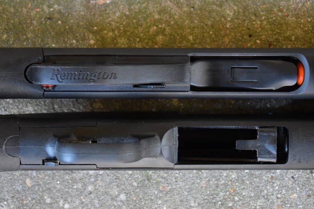 The pivoting shell carrier assemblies on each are noticeably different, with the Remington on top having more "meat" to it. As a bonus for Mossberg, their carriers have fewer problems cycling 1.75-inch "mini shells" such as those marketed by Aquila and now by Federal, while an 870 just will not go smaller than a 2.75-inch shell without jamming up. Also, note the synthetic trigger assemblies. Both companies have used polymer trigger assemblies in their standard models for decades, saving alloy or steel assemblies for more upscale military and law enforcement variants like the M590A1 and 870P.