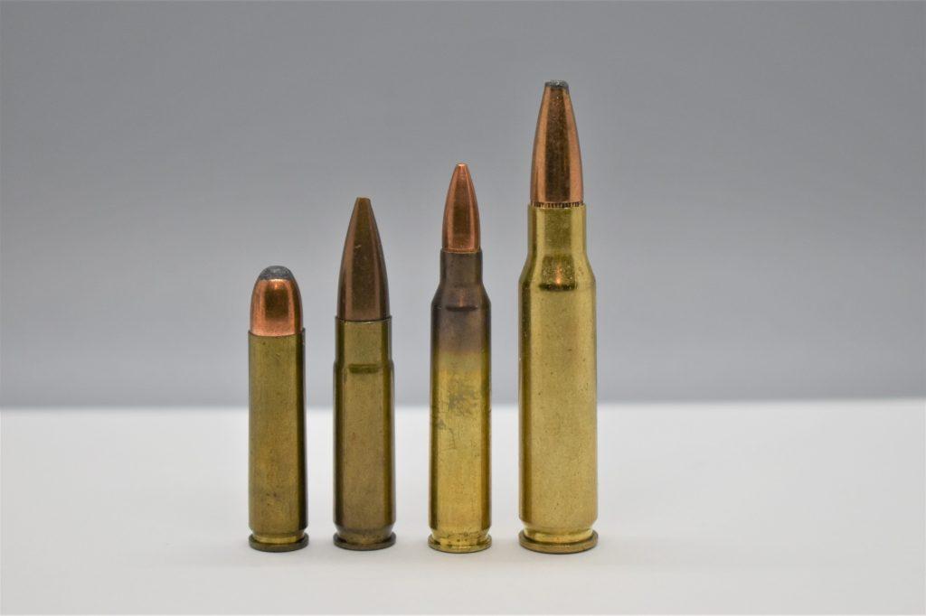 From left to right: 30 cal Carbine,  300BLK, 5.56mm NATO, and 7.62x51. You can see the  Blackout has a bullet roughly the same size as the 7.62x51 round.