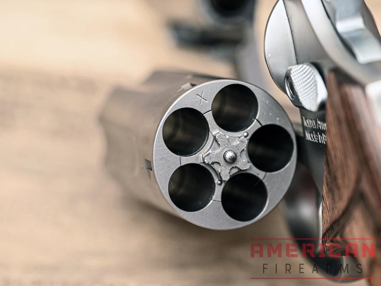 You can run five .45 Colt, .410 shells or any combo of the two.