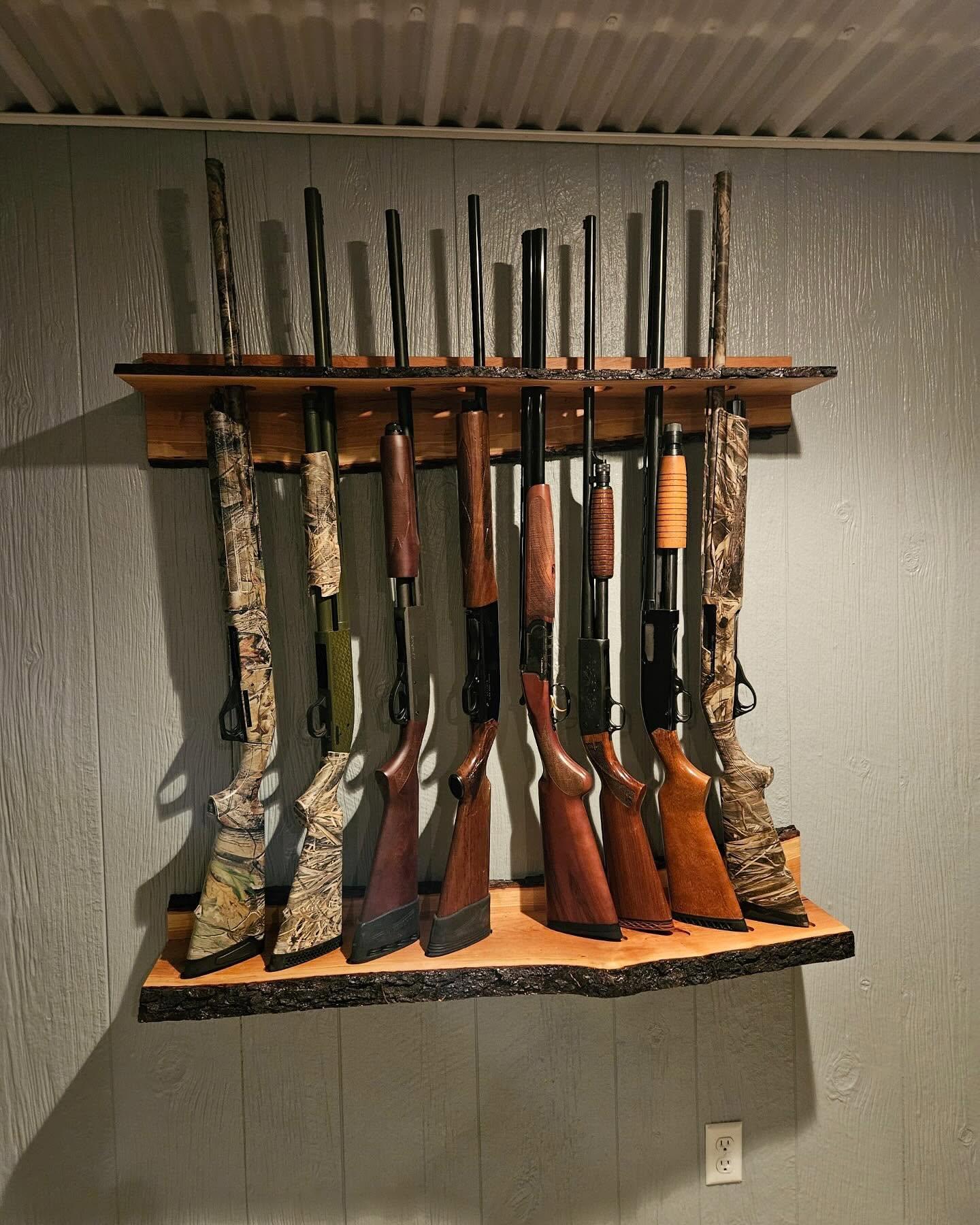 Vertical gun racks store the firearms pointing at the floor or the ceiling.