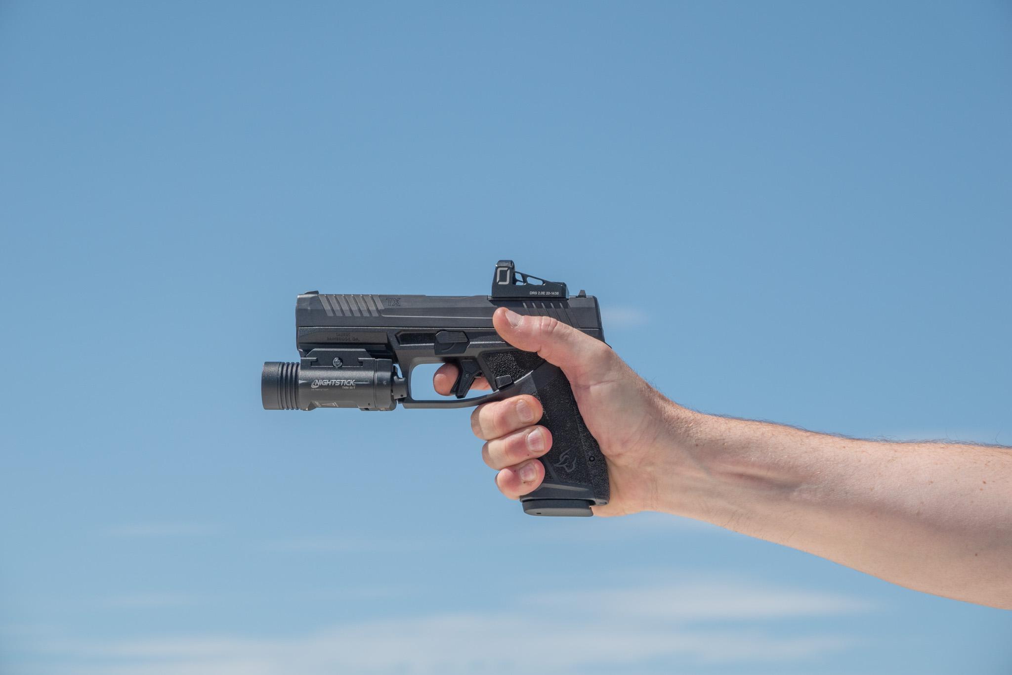 The bladed trigger safety is the only passive safety on the TX9—no manual lever, no decocker. Draw and fire without fumbling with levers or toggles.